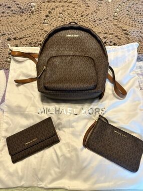 Michael Kors Brown Monogram Backpack with Matching Wallets